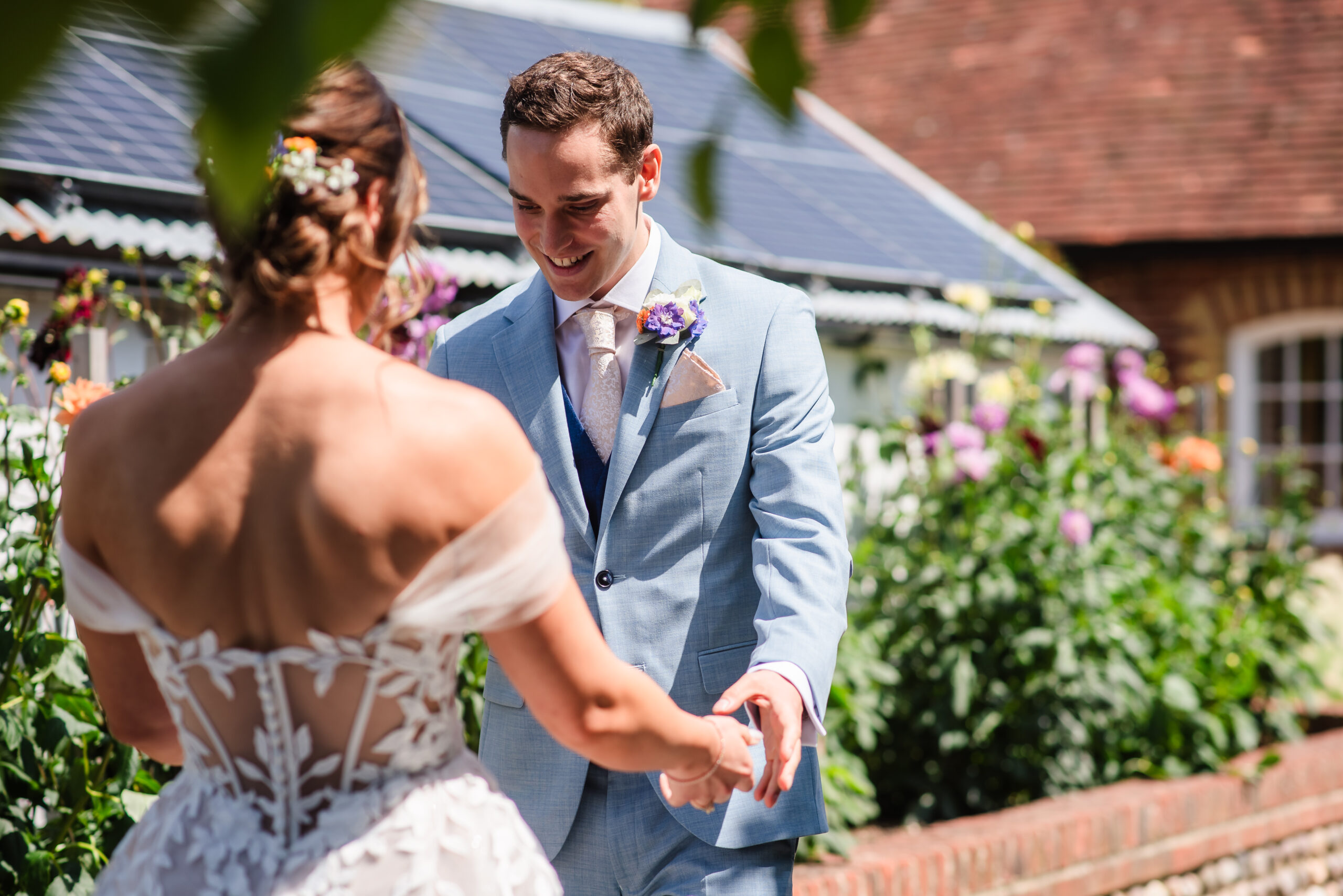 Southend Barn wedding photography first look in the garden
