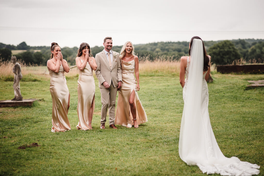 Reactions during the first look with the bridal party