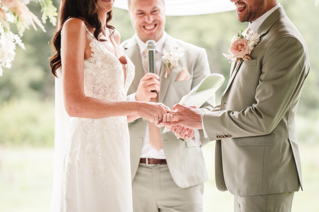 Bride and groom exchanging rings during the ceremony