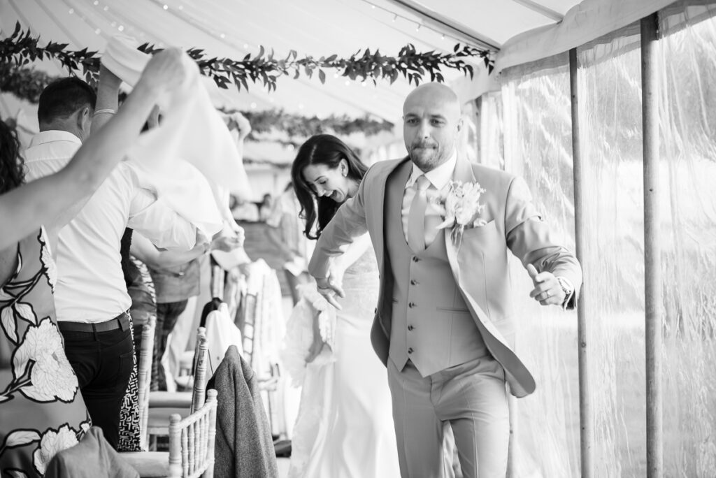 Bride and groom big entrance before speeches